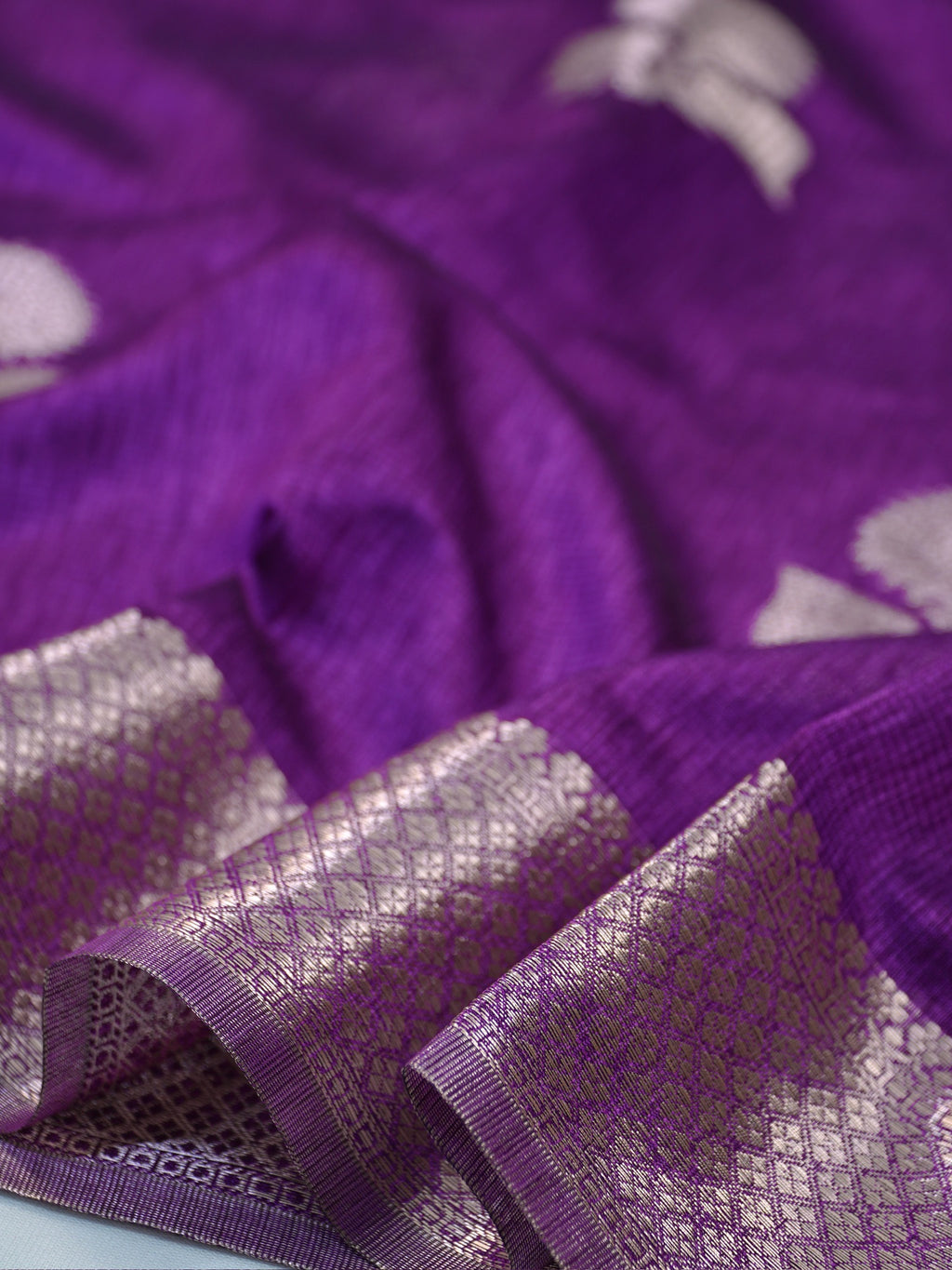 Royal Purple Soft Linen Silk Saree with Floral Silver Zari Butis & Woven Lattice Border